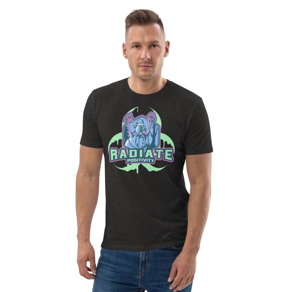 Man with hands in a neutral position and body slightly inclined to the right looking straight at you while wearing a t-shirt featuring some kind of Radioactive Evil Snowman with the radioactive symbol behind and the quote "Radiate Positivity", this trying to be a funny radiation pun.