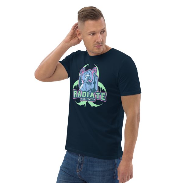 Man with body inclined to his right, looking at the left with his right arm touching the back of his head for stylish posing purposes, wearing a t-shirt with some kind of Radioactive Evil Snowman with the radioactive symbol behind and the quote "Radiate Positivity", this trying to be a funny radiation pun.