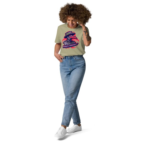 Woman with legs crossed, right hand on her pocket and left hand on her face looking down smiling and posing in a fashionable way while wearing a sustainable organic cotton t-shirt with the design of a plague doctor and the radioactive symbol behind with the quote "Radiate Positivity" trying to be a creative and funny radiation pun t-shirt
