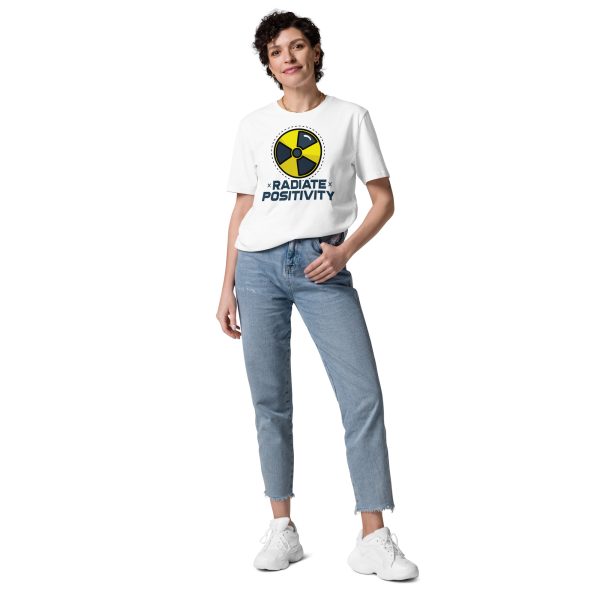 Woman posing in a trendy way with her left hand on her pocket while wearing a t-shirt with an Icon that is used to represent radioactive danger with the quote "Radiate Positivity", this is supposed to be a funny and not at all corny radiography pun.