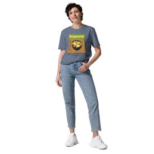 Woman posing with her left hand in her pocket, smiling directly at you with her hips inclined to her right. She is wearing a t-shirt that features the design of a plate of what appears to be ramen noodle soup, with the logo above saying: Soupreme; this not being related to any particular brand, only intended to be a funny joke regarding the soup design from below.