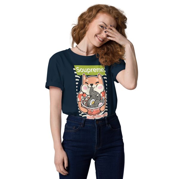Woman smiling with her left hand on covering her face, which is slightly inclined downwards and more to the left, wearing a t-shirt that features the design of Shiba Inu, a dog that is used as the image of a famous Cryptocurrency, eating ramen noodles, drawn in japanese anime/manga style with the text: Soupreme, not related at all to any particular brand, just intended to be funny because it is referring to the main design which is related to soup, specifically ramen noodles.