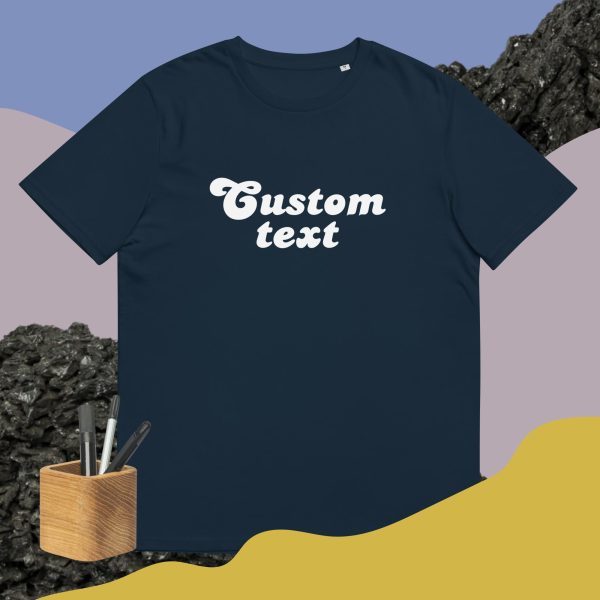 Navy custom shirt with a cool and dinamic background and some pencils that symbolize how this t-shirt is customizable and can be bought with your custom design printed on it.